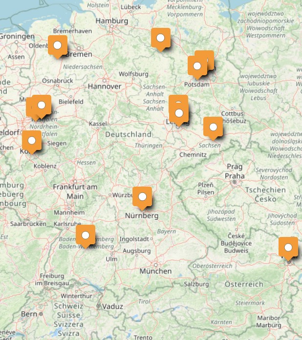 Screenshot aus Open Street Map mit einer Karte von Deutschland, Schweiz und Österreich mit Markierungen für Wissenschaftsläden.